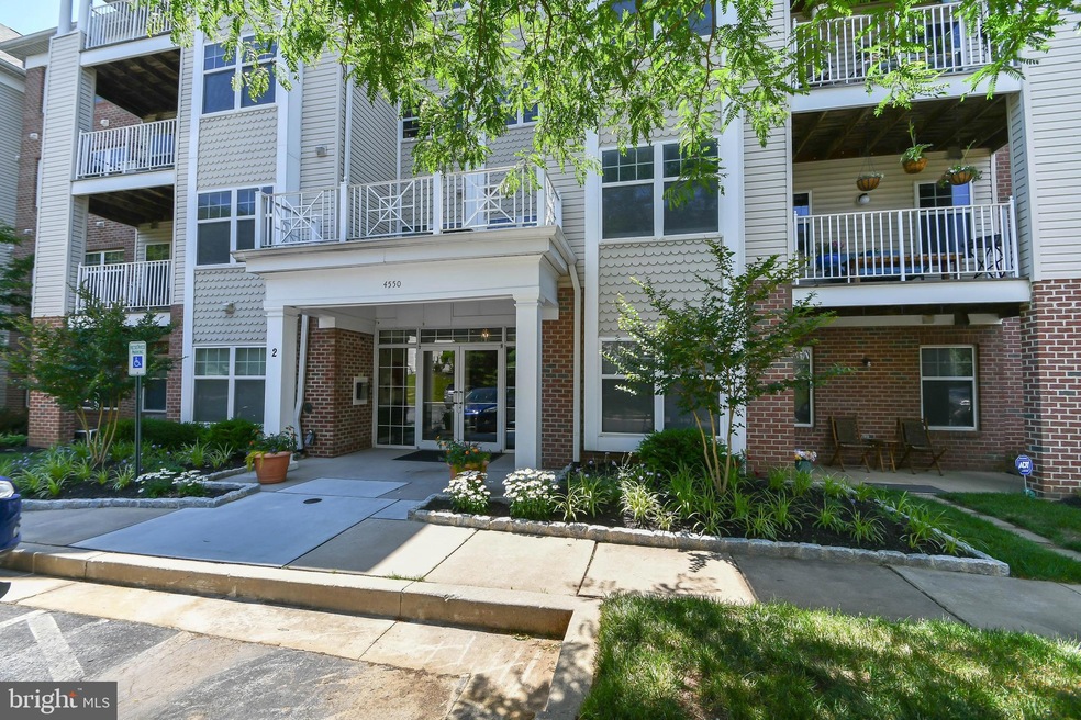 4550 Chaucer Way unit 402, Owings Mills, MD 21117 - photo 1
