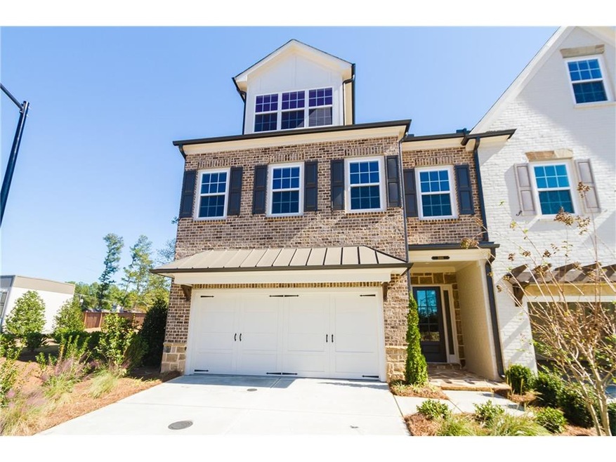 Homesite 5 is a sunny END unit with brick, stone a