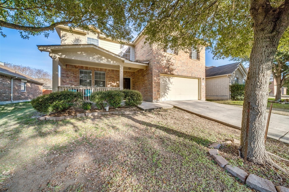Traditional-style house featuring a porch, an att
