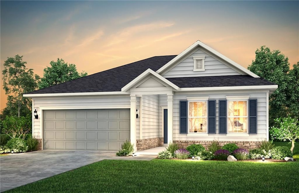 Single story home featuring an attached garage, st