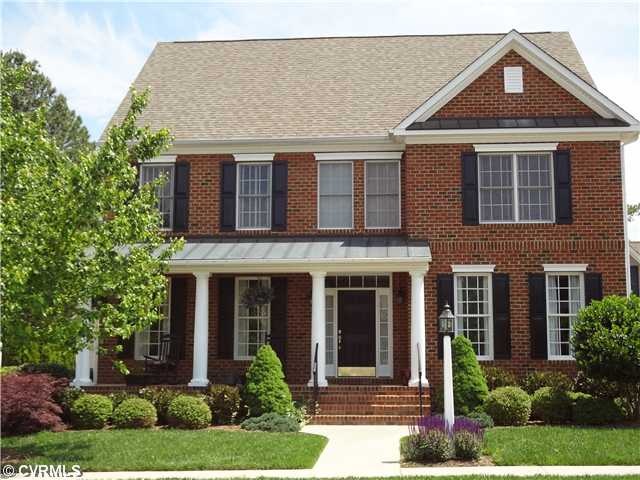 Exterior Front - Beautiful porch and nicely landsc