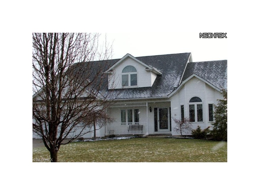 Contemporary colonial with welcoming front porch  