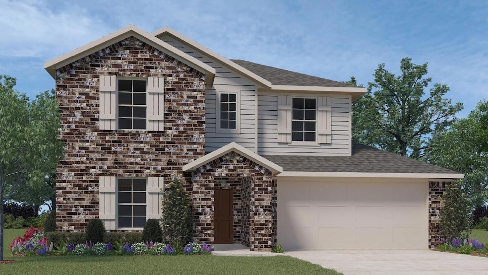 View of front of property with brick siding, a shi