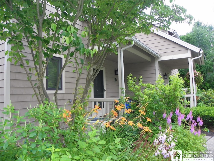 Lovely gardens surround your front porch.  29 town