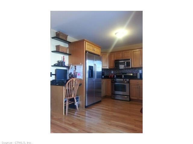 Exterior Front. Kitchen with granite countertops a