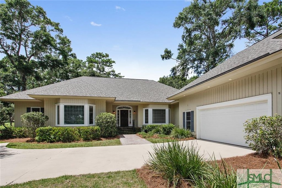 Professional landscaping gives this custom-built h