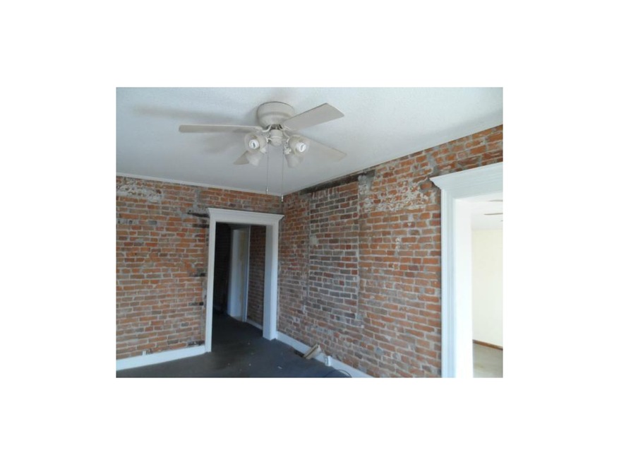 Previous owner was exposing brick wall.
