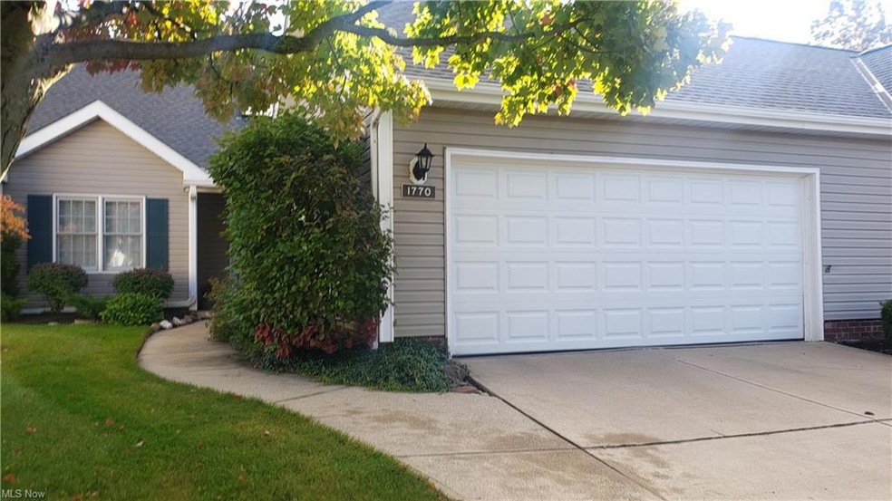 FRONT VIEW OF HOME W/LARGE 2.5 CAR GARAGE
