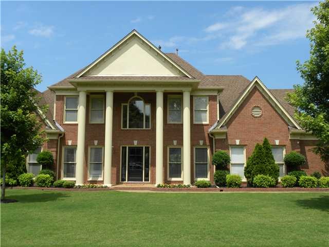 STATELY TWO STORY FAMILY HOME NESTLED AT END OF QU