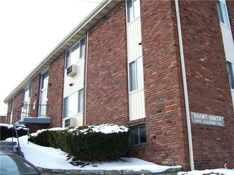 Exterior Front. Front view of the 8 unit secured a