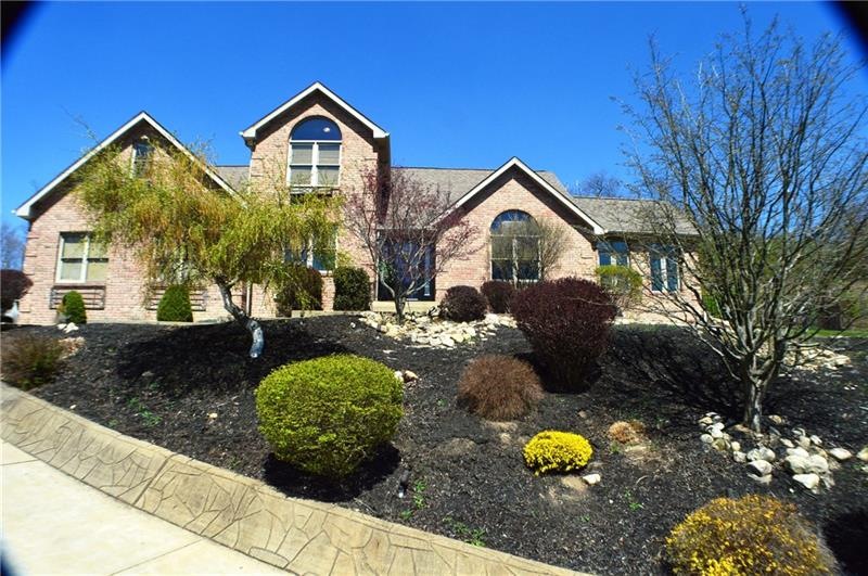 Fully bricked, contemporary 2 story with concrete 