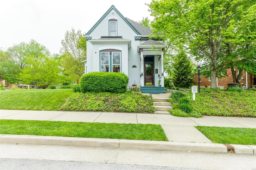 1889 Historic Queen Ann Brick Home on Impeccably M