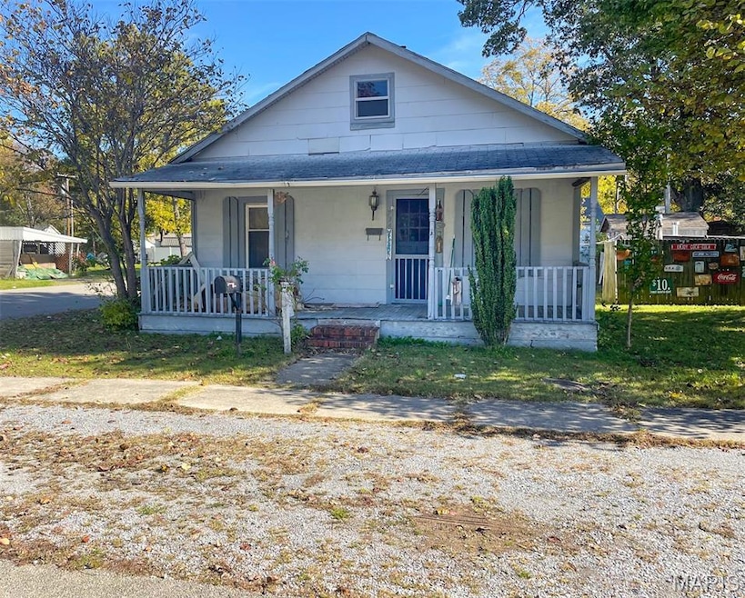 Bungalow featuring a porch