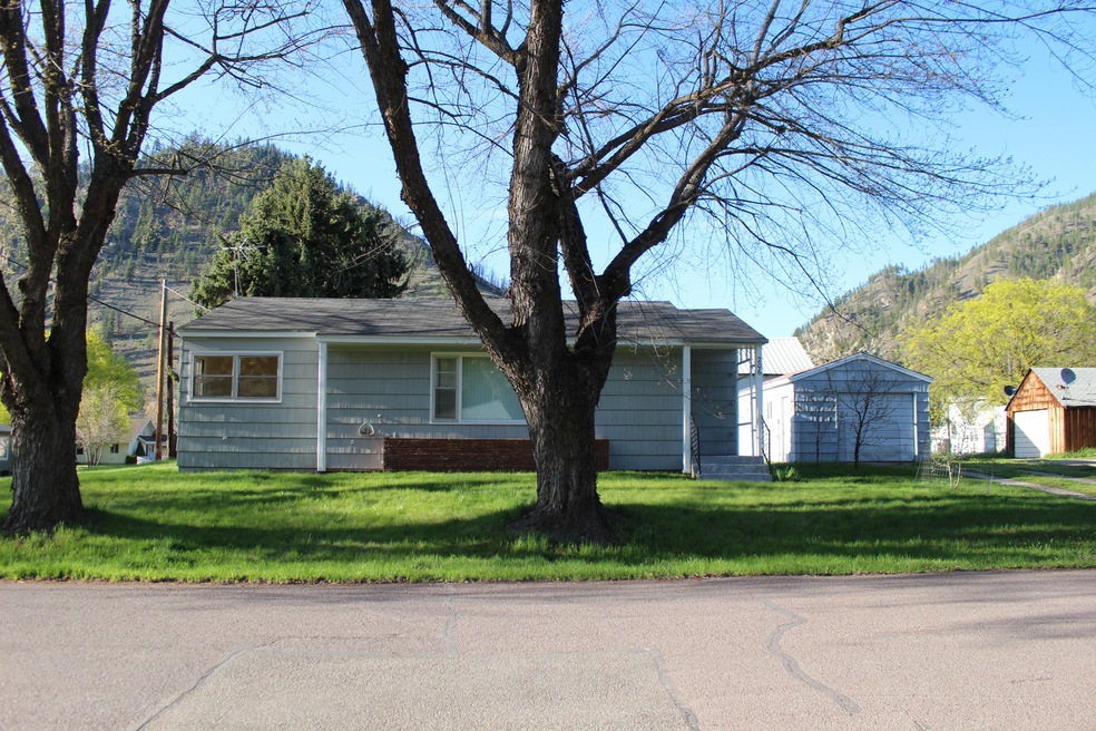 Home, 1 car garage and shop building
