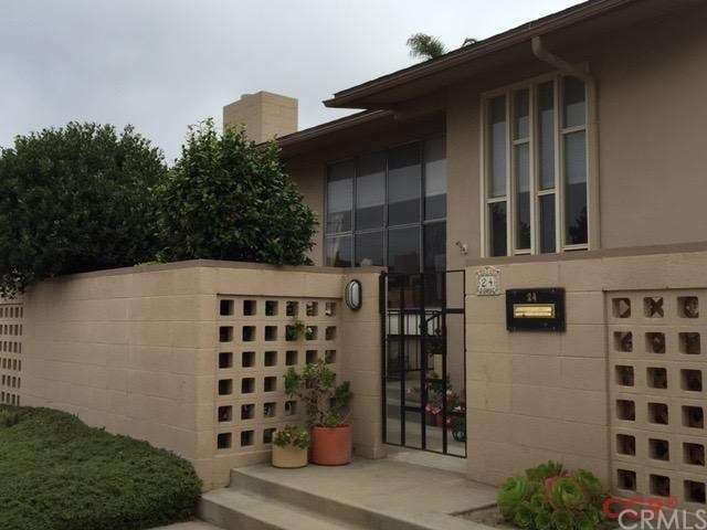 Front of condo with patio.