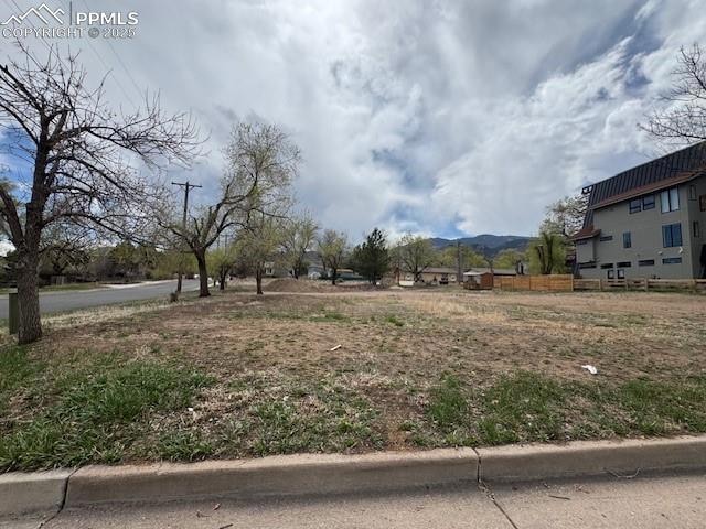 View of yard with a mountain view