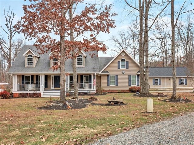 Enjoy Quiet Country Living on 6 acres w/ an Open F