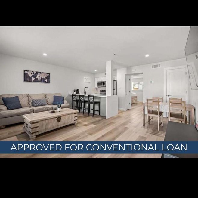 Living area with light wood-style floors and rece