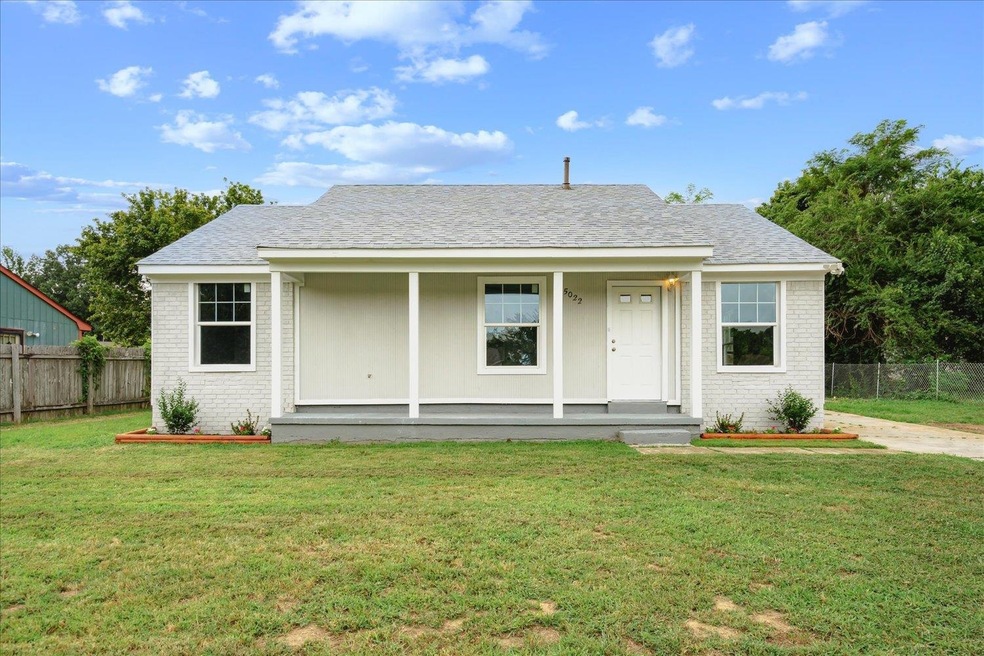 View of front of house with a front lawn
