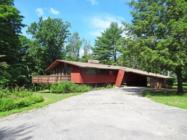 Contemporary Deck House w/carport