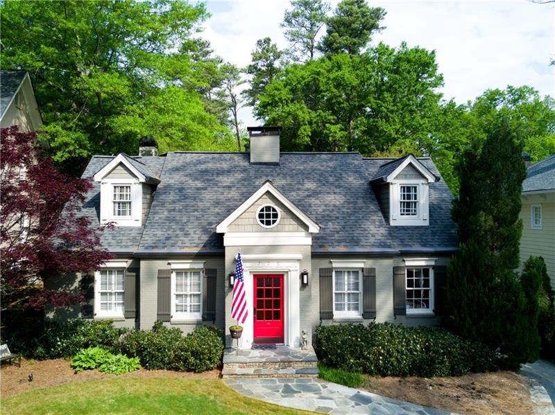 Beautifully landscaped 1.5 story home-very deceivi