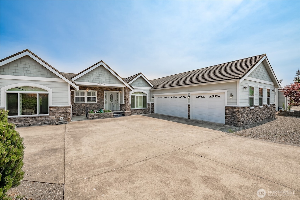 8118 Comox road 4703 sq. ft. Grand Slam with water, marina, mountain views, extra parking, main level primary living with large 2 bedroom 1 full bath suite at the Garden level.