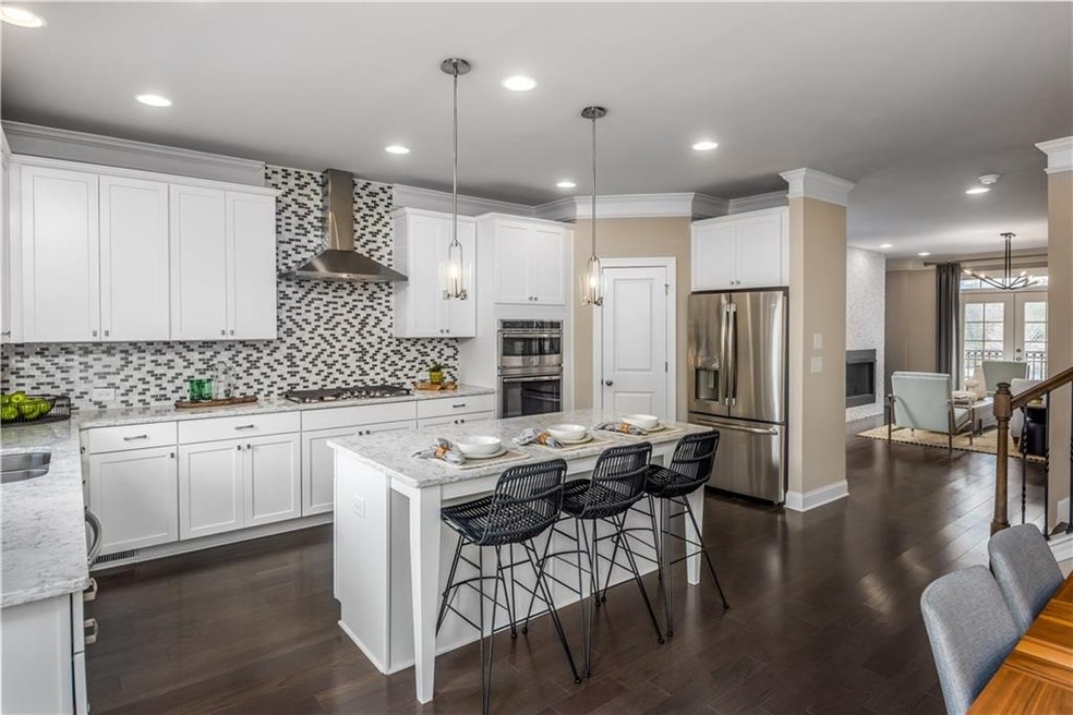Stock photos of same floorplan.
