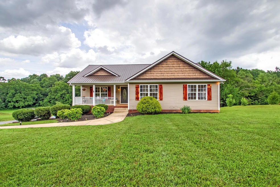 Beautiful Home with gorgeous BRAND NEW cedar wooden shutters.