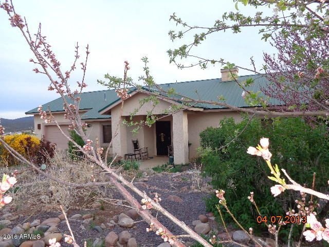 Peach trees & flower beds in front yard