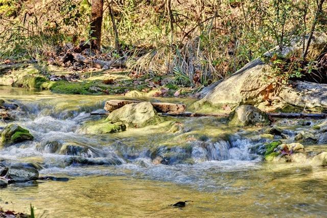 There is a creek that flows all year long on the back of the property.