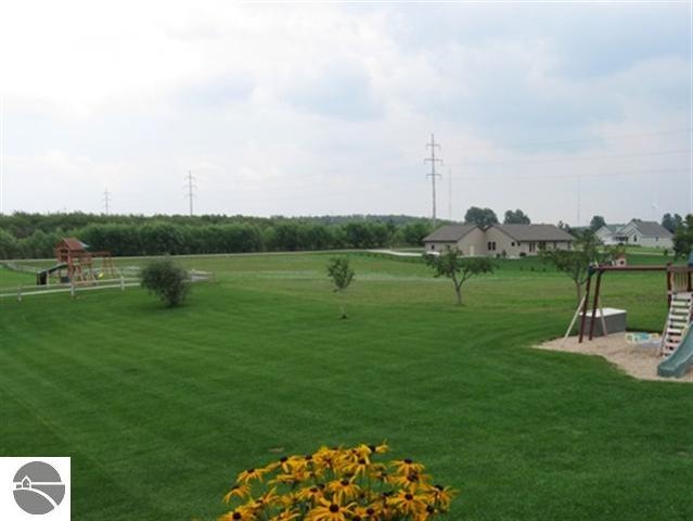 000 E Longbranch Cir, Traverse City, MI 49684 - photo 1