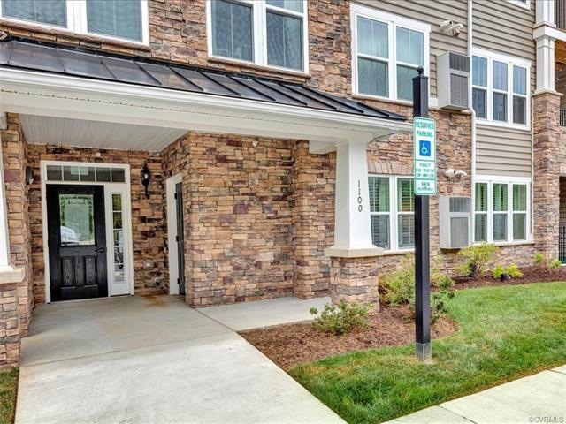 Unit 204 is on the entry level of the building, wh