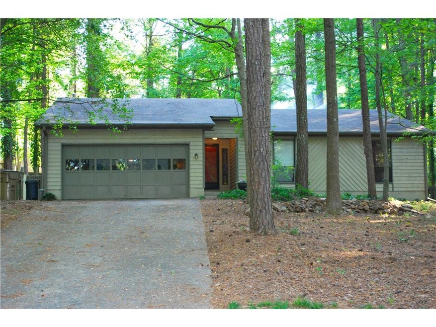 This open floor plan ranch is located on a peacefu