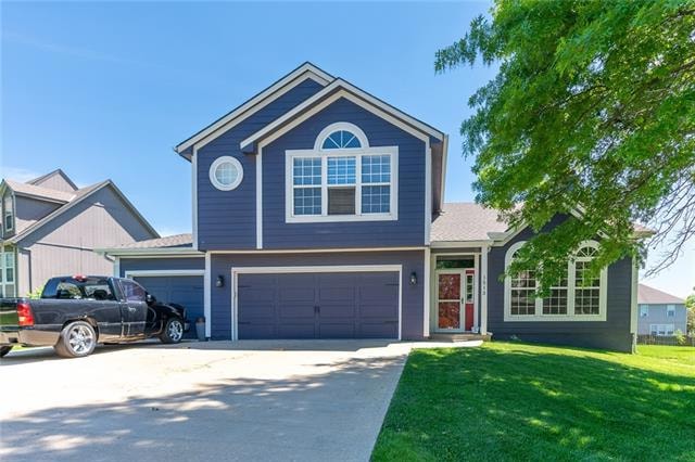 1513 Colt Cir, Raymore, MO 64083 - photo 1