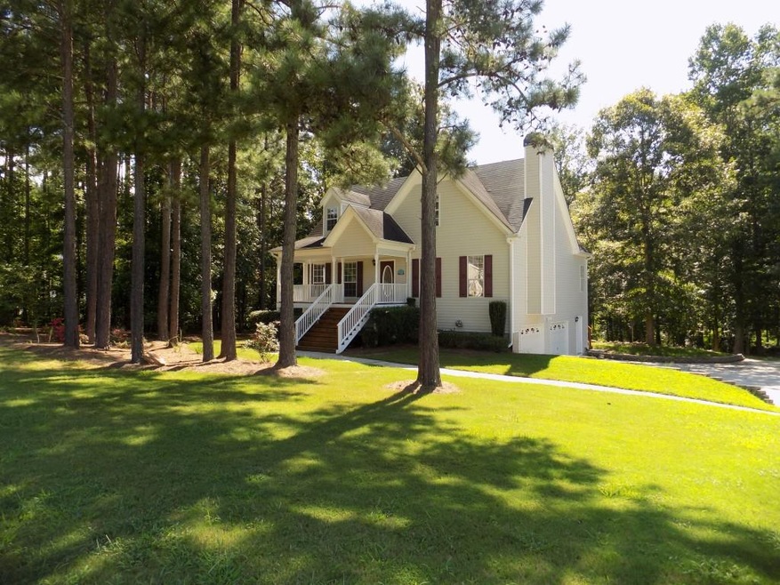 Gorgeous Cape Cod Home on over 1 acre Level Lot
