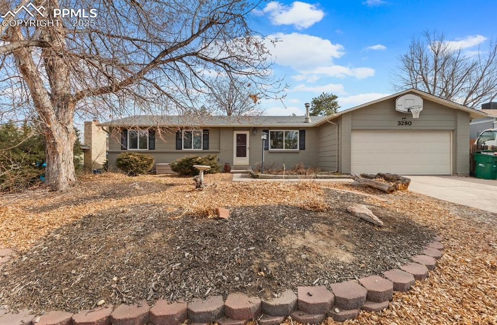 Ranch-style home featuring a garage