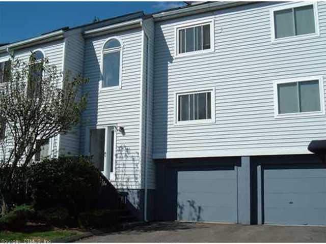 Exterior Front. Fantastic Townhouse with 2 Car Tan