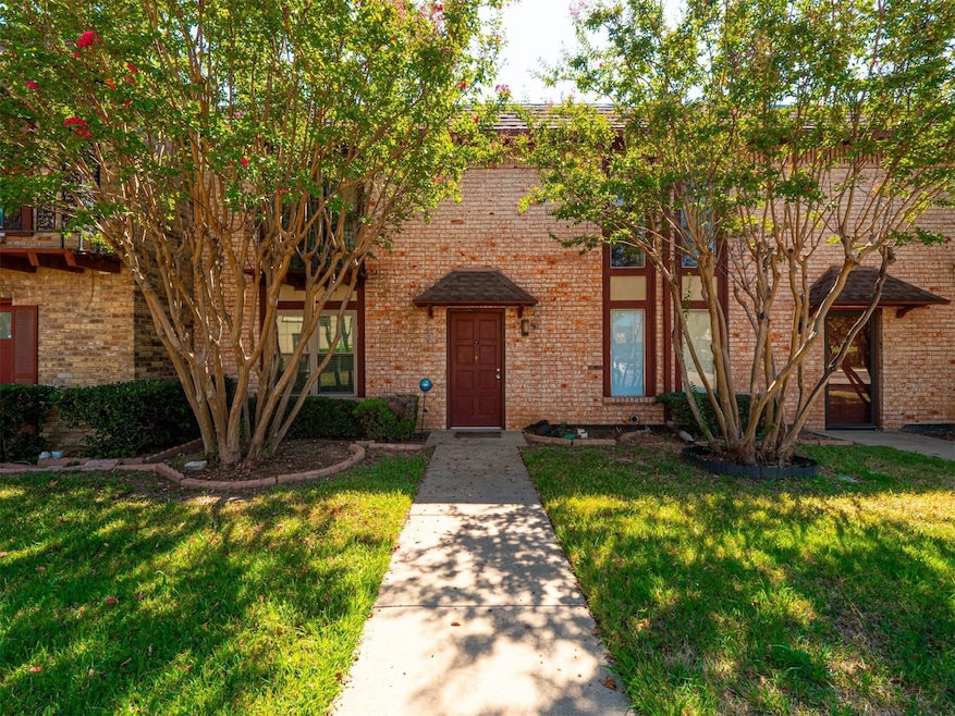 View of front of property featuring front lawn