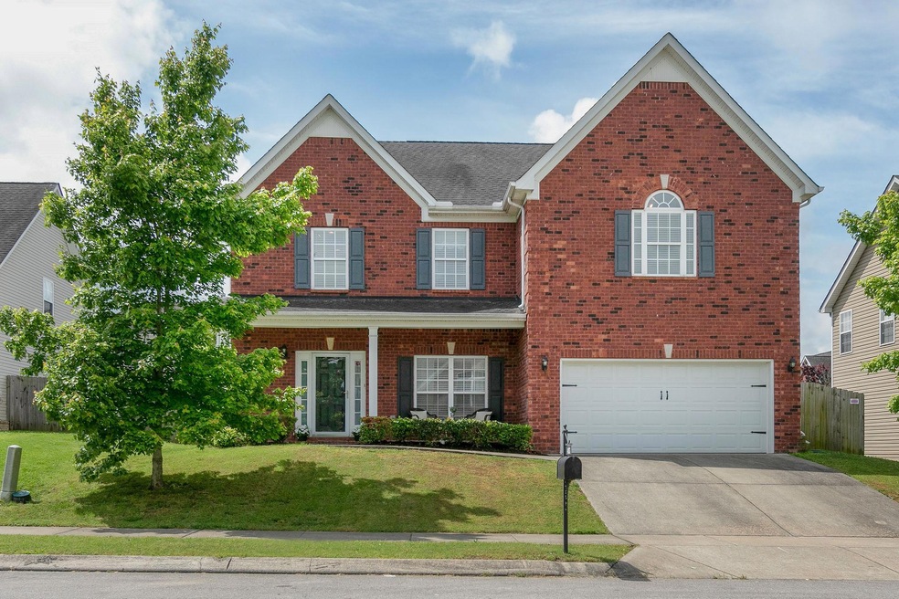Offering a flexible 4 or 5 bedroom plan, this stunning Spring Hill home has Upgrades, Neutral Decor, a privacy fenced yard & Williamson County Schools.