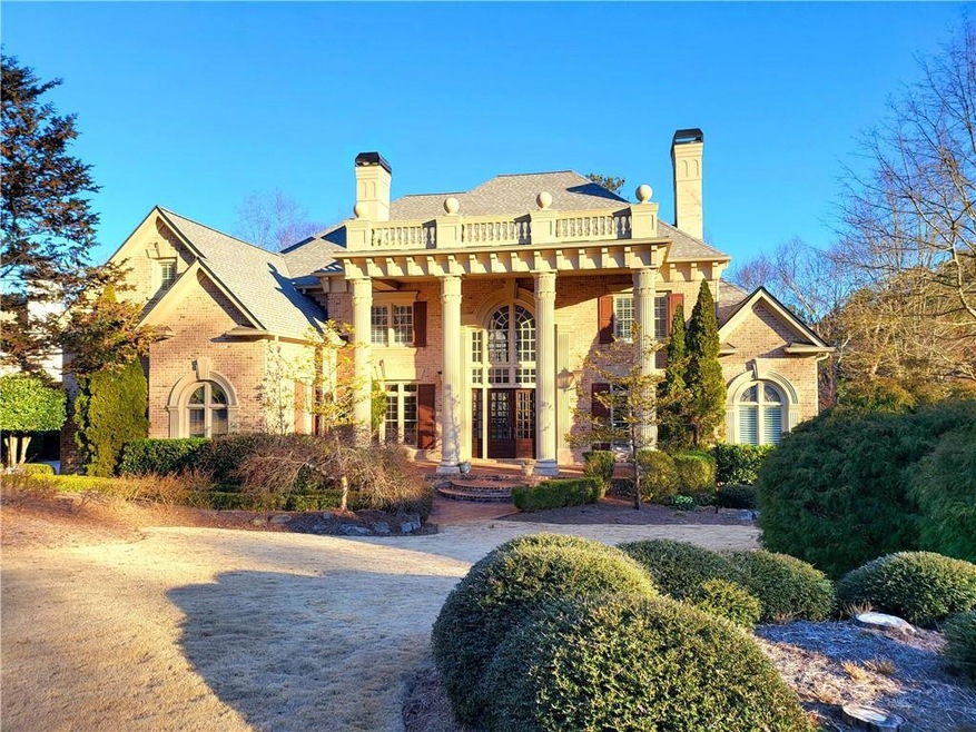 Greek revival house featuring french doors