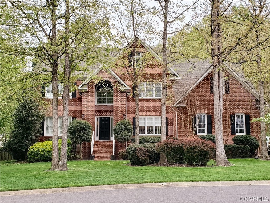 Stately transitional with brick front, hardie plan