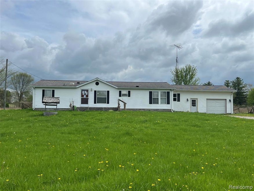 8145 Oatman Rd, Greenwood, MI 48006 - photo 1