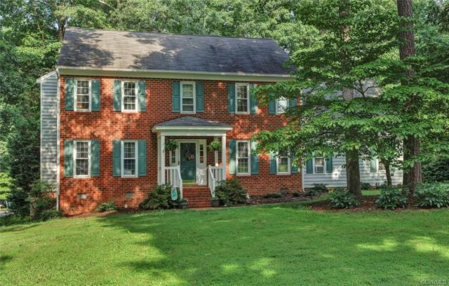 Corner lot, brick and vinyl siding.