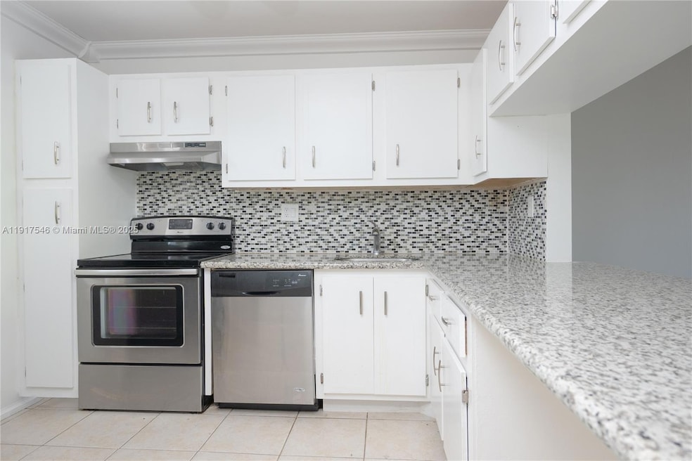 8330 Sands Point Blvd unit N307, Tamarac, FL 33321 - photo 1