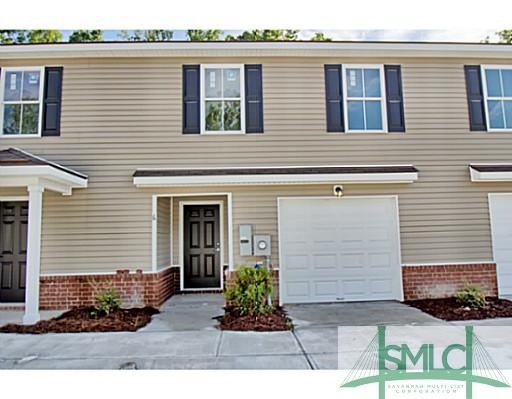 Exterior Front. Unit 6 is second from left with ga