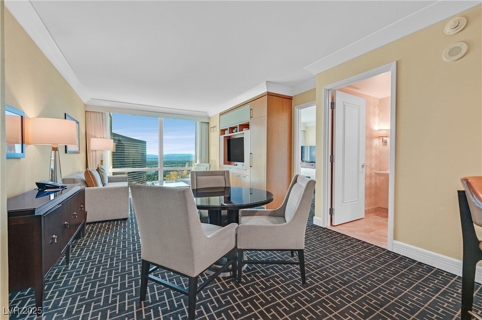 Dining room with dark carpet