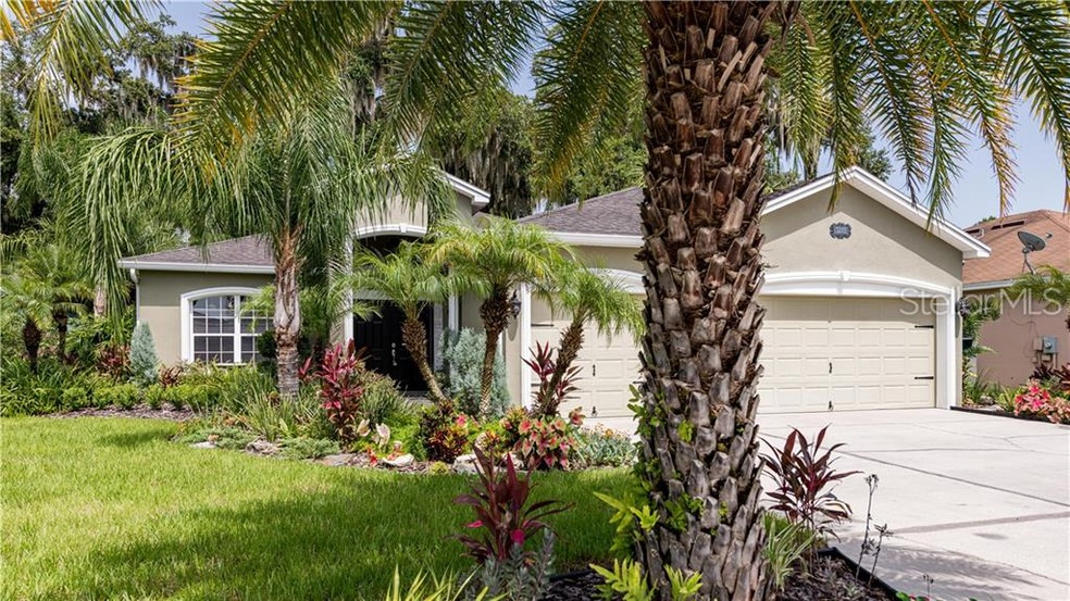 This beautifully landscaped home is ready for it's
