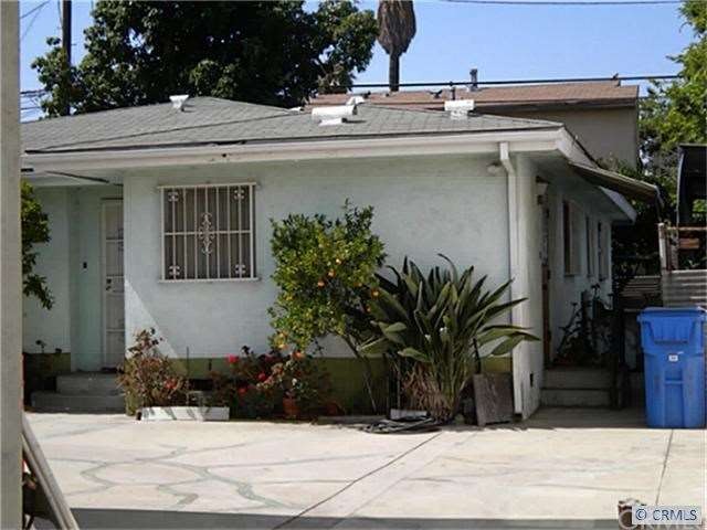1859 W ADAMS 3BD 2 BA SFR (BEHIND RETAIL BUILDING)