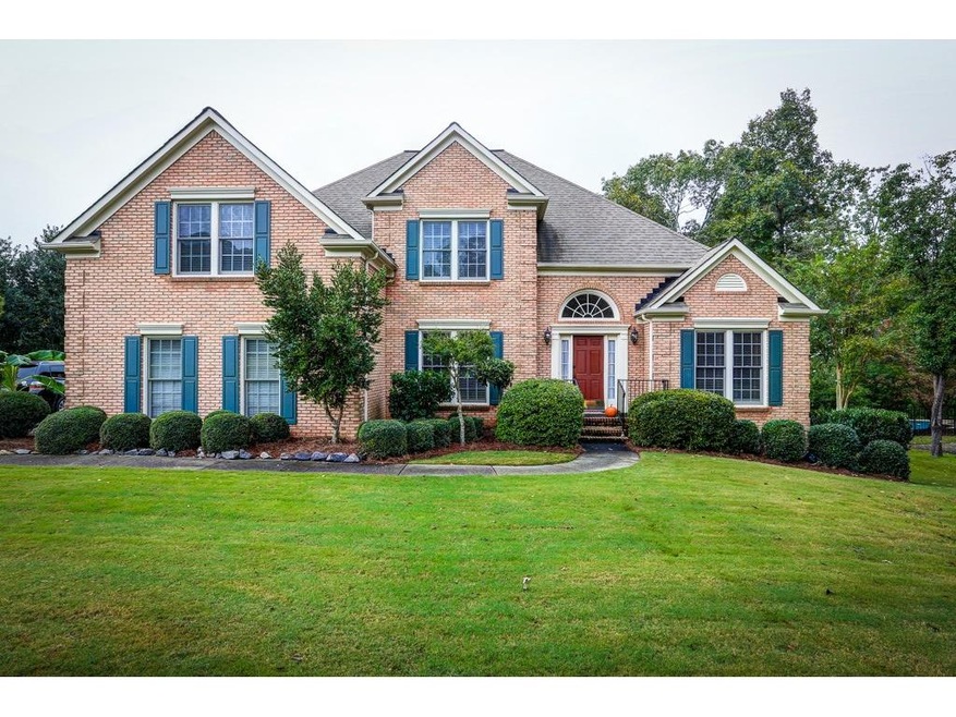 front of home- 3 sides brick....level yard... 2 ca