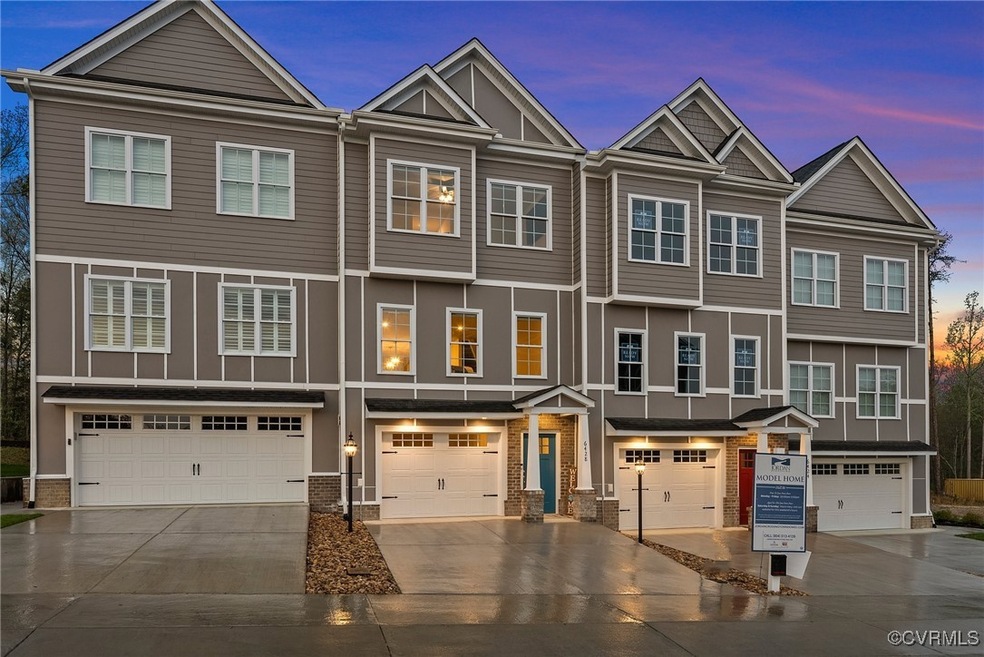 Craftsman-style house with an attached garage, bri